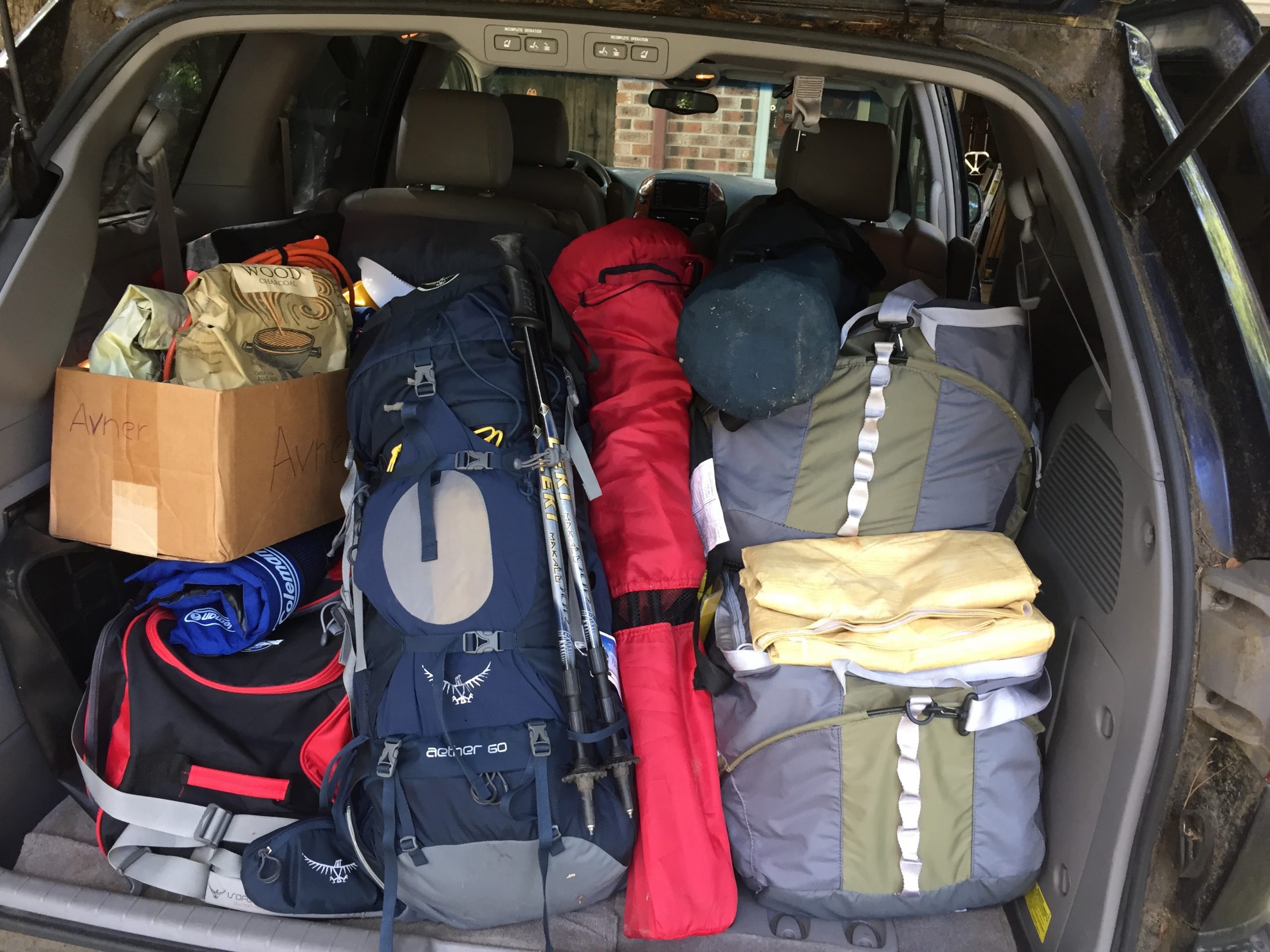 car full of camping gear